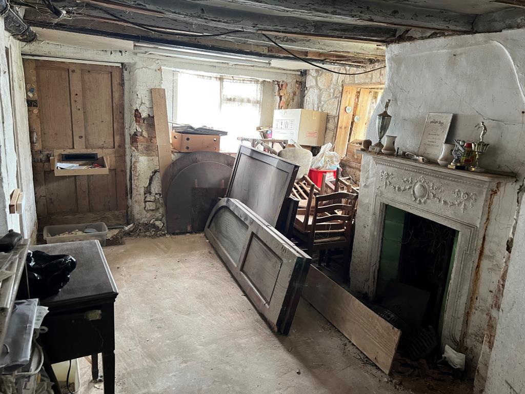 Lot: 128 - THREE-BEDROOM COTTAGE FOR IMPROVEMENT IN POPULAR VILLAGE LOCATION - Dining Room with access to the front